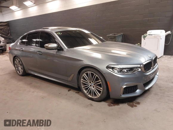 2020 BMW 5 Series M550i xDrive with VIN WBAJS7C00LCD83735, listed as a IAAI auction lot 41478682 with 39,299 mi miles and . Bid and sale history available at DreamBid. Image 1.