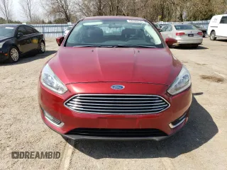 2016 Ford Focus Titanium z VIN 1FADP3J24GL272970, wystawiony jako Copart lot #54539215 z przebiegiem 60 007 mil mil oraz Czysty tytuł • Clean title. Historia ofert i sprzedaży dostępna na DreamBid. Obrazek 5.