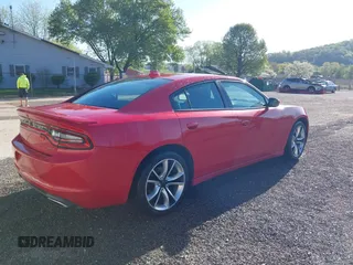 2015 Dodge Charger SXT with VIN 2C3CDXHGXFH858399, listed as a IAAI auction lot 42090958 with 71,488 mi miles and . Bid and sale history available at DreamBid. Image 4.