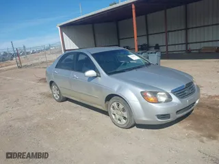 2009 Kia Spectra EX with VIN KNAFE221995647605, listed as a IAAI auction lot 41680420 with 169,000 mi miles. Bid and sale history available at carsss.com. Image 1.