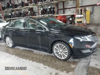 2016 Lincoln MKZ Hybrid z VIN 3LN6L2LU0GR608232, wystawiony jako IAAI lot #41034486 z przebiegiem 99 637 mil mil oraz . Historia ofert i sprzedaży dostępna na DreamBid. Obrazek 1.
