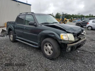 2004 Ford Explorer Sport Trac XLS with VIN 1FMZU67K04UA70503, listed as a Copart auction lot 58214785 with 195,688 mi miles and Salvage title. Bid and sale history available at DreamBid. Image 4.