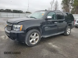 2014 Chevrolet Suburban LT with VIN 1GNSCJE05ER138819, listed as a Copart auction lot 43324175 with 218,114 mi miles and Salvage Title. Bid and sale history available at carsss.com. Image 1.