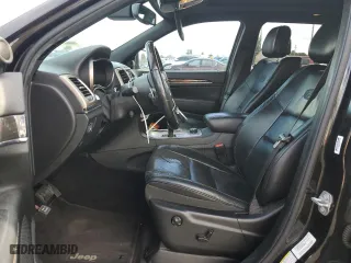 2014 Jeep Grand Cherokee Overland with VIN 1C4RJFCM6EC299263, listed as a Copart auction lot 45759425 with 176,339 mi miles and Salvage Title. Bid and sale history available at carsss.com. Image 7.