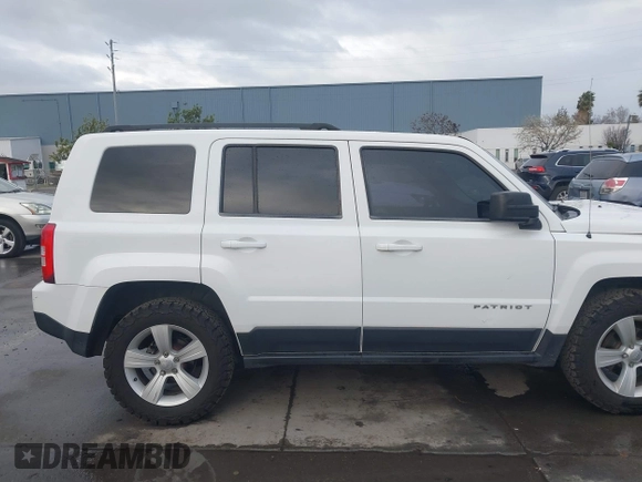 2014 Jeep Patriot Sport with VIN 1C4NJRBB3ED509117, listed as a IAAI auction lot 41799057 with 161,663 mi miles. Bid and sale history available at carsss.com. Image 13.
