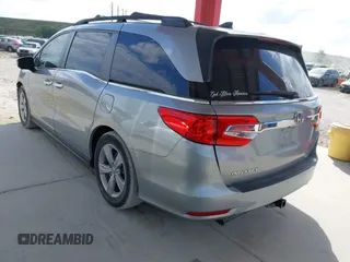 2020 Honda Odyssey EX-L with VIN 5FNRL6H72LB055672, listed as a IAAI auction lot 41586663 with 47,037 mi miles and . Bid and sale history available at carsss.com. Image 3.