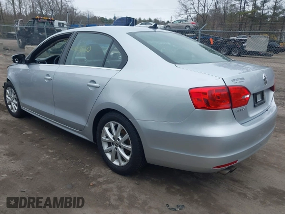 2014 Volkswagen Jetta SE with VIN 3VWD17AJ7EM331139, listed as a IAAI auction lot 41813500 with 110,233 mi miles and . Bid and sale history available at DreamBid. Image 3.