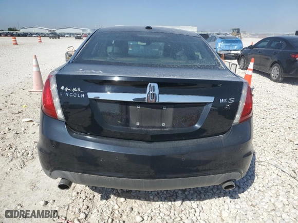 2012 Lincoln MKS with VIN 1LNHL9DR6CG801708, listed as a Copart auction lot 52197515 with 90,651 mi miles and Salvage Title. Bid and sale history available at carsss.com. Image 6.