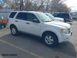 2010 Ford Escape XLT with VIN 1FMCU0DG5AKD21364, listed as a IAAI auction lot 41944101 with 179,724 mi miles. Bid and sale history available at carsss.com. Image 1.