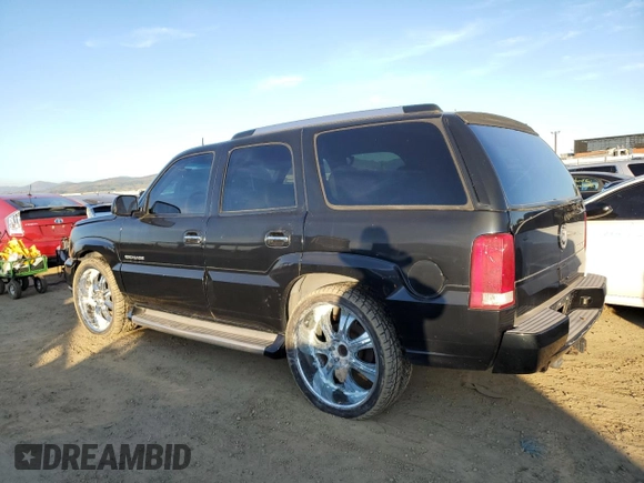 2003 Cadillac Escalade z VIN 1GYEC63TX3R135227, wystawiony jako Copart lot #88373245 z przebiegiem 258 595 mil mil oraz Czysty tytuł • Clean title. Historia ofert i sprzedaży dostępna na DreamBid. Obrazek 2.