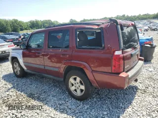 2007 Jeep Commander Sport with VIN 1J8HG48K07C684965, listed as a Copart auction lot 58061005 with 208,951 mi miles and Salvage title. Bid and sale history available at DreamBid. Image 2.