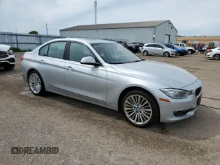 2013 BMW 3 Series 328i xDrive with VIN WBA3B3C5XDF531142, listed as a Copart auction lot 58651745 with 209,990 mi miles and Clean title. Bid and sale history available at DreamBid. Image 4.