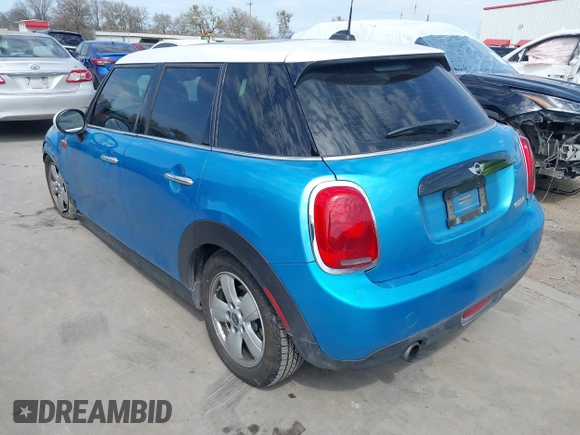 2017 MINI Hardtop 4 Door Cooper with VIN WMWXU1C53H2E17614, listed as a IAAI auction lot 41686204 with 53,409 mi miles and . Bid and sale history available at DreamBid. Image 3.