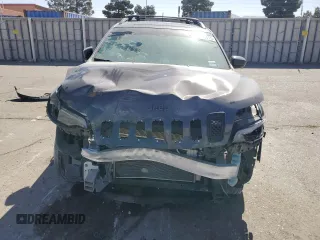 2021 Jeep Cherokee 80th Anniversary with VIN 1C4PJMMX2MD106233, listed as a Copart auction lot 52980415 with 77,979 mi miles and Salvage title. Bid and sale history available at DreamBid. Image 5.