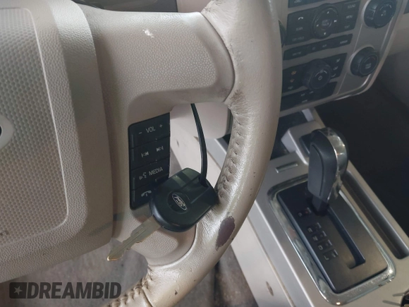 2009 Ford Escape Hybrid with VIN 1FMCU59399KC34999, listed as a IAAI auction lot 42515815 with 201,130 mi miles and . Bid and sale history available at DreamBid. Image 11.
