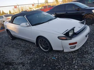 1993 Toyota Celica z VIN JT5ST87K6P0145748, wystawiony jako IAAI lot #41401540 z przebiegiem 165 469 mil mil oraz . Historia ofert i sprzedaży dostępna na DreamBid. Obrazek 1.