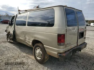 2010 Ford Econoline Passenger XL with VIN 1FMNE1BWXADA30935, listed as a Copart auction lot 77912734 with 153,775 mi miles and Salvage Title. Bid and sale history available at DreamBid. Image 2.