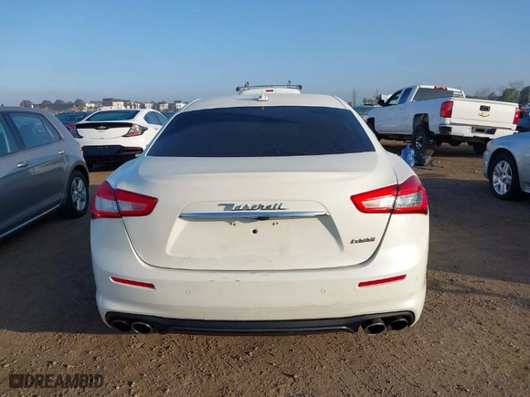 2018 Maserati Ghibli with VIN ZAM57XSA8J1301784, listed as a IAAI auction lot 41472998 with 32,500 mi miles. Bid and sale history available at carsss.com. Image 16.
