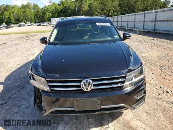 2018 Volkswagen Tiguan S с VIN 3VV0B7AXXJM122461, выставлен на аукционе Copart как лот 56054285 с пробегом 77 176 миль миль и Списание • Salvage title. История ставок и продаж доступна на DreamBid. Изображение 5.