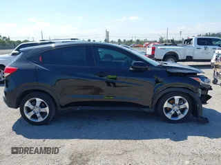 2021 Honda HR-V LX with VIN 3CZRU5H34MM726934, listed as a IAAI auction lot 41797859 with 139,927 mi miles. Bid and sale history available at carsss.com. Image 14.