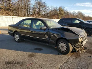 1996 Mercedes-Benz E Class with VIN WDBJF20F6TJ020530, listed as a Copart auction lot 79484094 with 0 mi miles and Salvage Title. Bid and sale history available at carsss.com. Image 4.