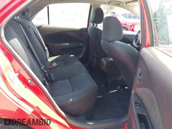2009 Toyota Yaris with VIN JTDBT903591342243, listed as a IAAI auction lot 42104557 with 407,106 mi miles. Bid and sale history available at carsss.com. Image 8.