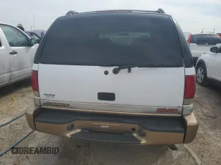 2000 GMC Jimmy SL with VIN 1GKCS13W4Y2106047, listed as a Copart auction lot 75257184 with 73,571 mi miles and Non Repairable. Bid and sale history available at carsss.com. Image 6.
