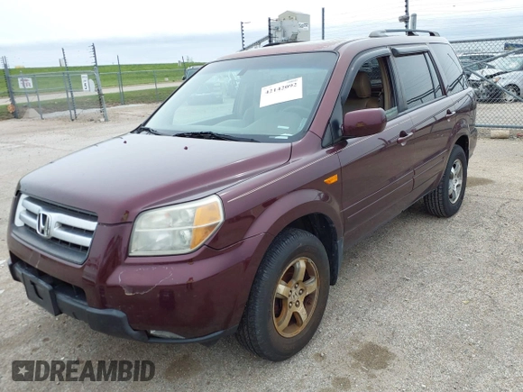 2007 Honda Pilot EX-L with VIN 5FNYF18537B021184, listed as a IAAI auction lot 42142092 with 245,462 mi miles. Bid and sale history available at carsss.com. Image 2.