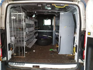 2016 Ford Transit Cargo z VIN 1FTYE1YM8GKB19172, wystawiony jako IAAI lot #42788511 z przebiegiem 143 978 mil mil oraz . Historia ofert i sprzedaży dostępna na DreamBid. Obrazek 28.