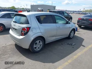 2013 Chevrolet Sonic LT with VIN 1G1JC6SG5D4210853, listed as a IAAI auction lot 42078806 with 135,837 mi miles. Bid and sale history available at carsss.com. Image 4.