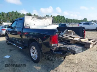 2014 Ram 1500 Sport with VIN 1C6RR7UT2ES136028, listed as a IAAI auction lot 42716600 with 119,148 mi miles and . Bid and sale history available at DreamBid. Image 3.