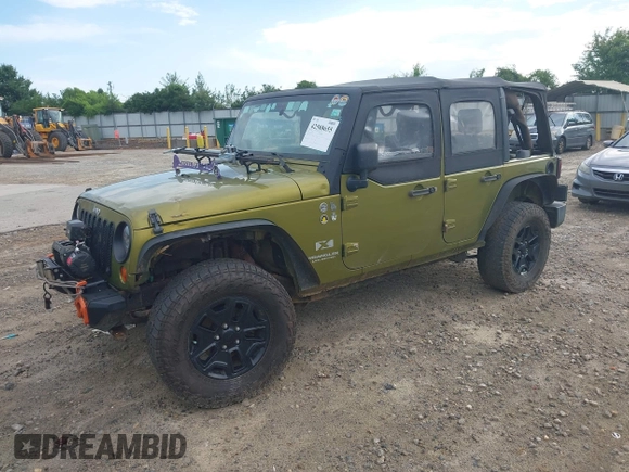 2007 Jeep Wrangler Unlimited X with VIN 1J4GA39177L164566, listed as a IAAI auction lot 42588655 with 50,915 mi miles and . Bid and sale history available at DreamBid. Image 18.