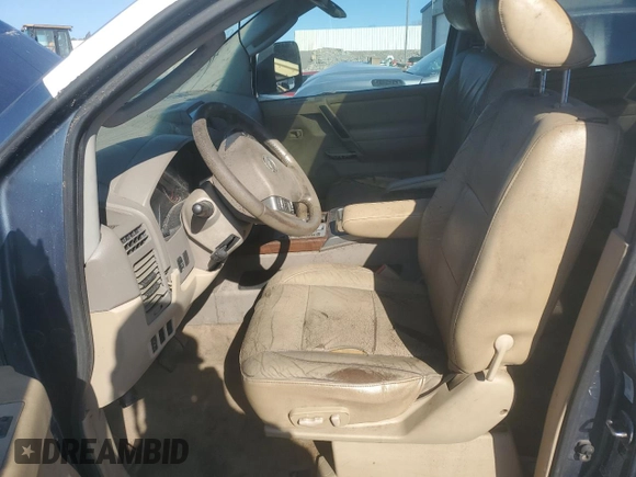 2011 Nissan Titan Pro-4X with VIN 1N6BA0ECXBN302004, listed as a Copart auction lot 89343945 with 427,682 mi miles and Salvage title. Bid and sale history available at DreamBid. Image 7.