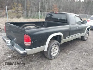 2001 Dodge Dakota SLT with VIN 1B7GG22XX1S255292, listed as a IAAI auction lot 41100133 with 168,454 mi miles and . Bid and sale history available at carsss.com. Image 4.