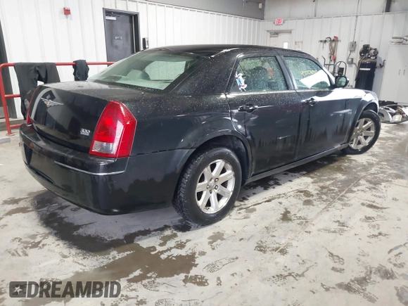 2007 Chrysler 300 Touring with VIN 2C3LA53G17H627980, listed as a IAAI auction lot 42006910 with 155,263 mi miles. Bid and sale history available at carsss.com. Image 4.