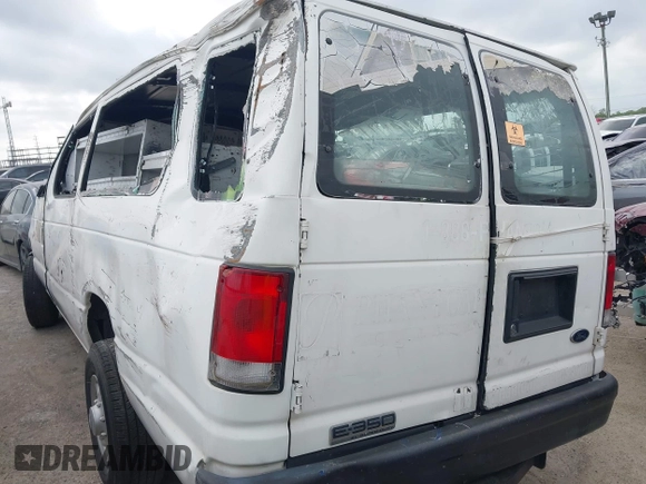 2014 Ford Econoline Wagon XL with VIN 1FBSS3BLXEDA71562, listed as a IAAI auction lot 41864794 with 140,942 mi miles. Bid and sale history available at carsss.com. Image 3.
