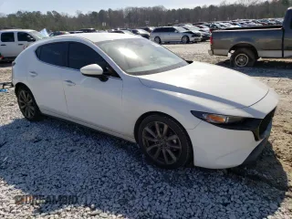 2019 Mazda Mazda3 Hatchback w/Preferred Pkg with VIN JM1BPBMM5K1127045, listed as a Copart auction lot 41734943 with 82,772 mi miles. Bid and sale history available at carsss.com. Image 4.