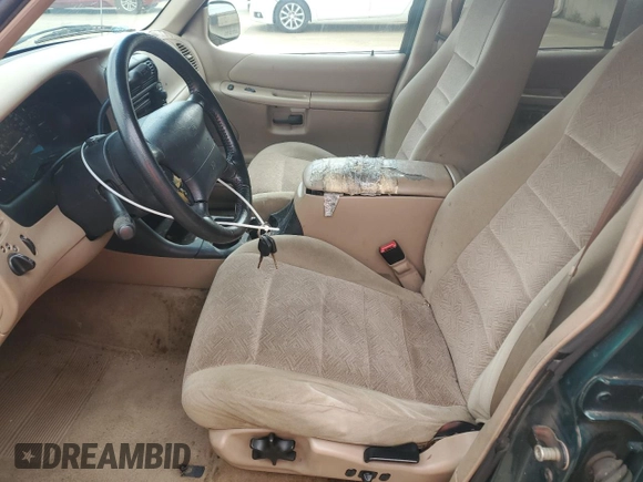 2000 Ford Explorer XLT с VIN 1FMZU73E2YZB13205, выставлен на аукционе Copart как лот 57918165 с пробегом 203 635 миль миль и Чистый • Clean title. История ставок и продаж доступна на DreamBid. Изображение 7.