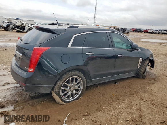2013 Cadillac SRX Premium Collection с VIN 3GYFNJE39DS650569, выставлен на аукционе Copart как лот 59947905 с пробегом 146 548 миль миль и Списание • Salvage title. История ставок и продаж доступна на DreamBid. Изображение 3.