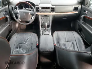 2012 Lincoln MKZ with VIN 3LNHL2JC3CR828543, listed as a Copart auction lot 56451355 with 127,865 mi miles and Salvage title. Bid and sale history available at DreamBid. Image 8.