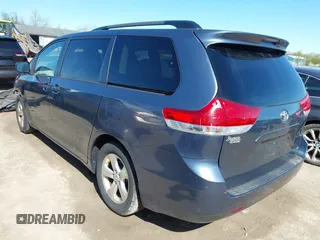 2014 Toyota Sienna LE AAS with VIN 5TDKK3DC4ES464647, listed as a IAAI auction lot 42132627 with 130,724 mi miles and . Bid and sale history available at DreamBid. Image 3.