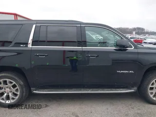 2015 GMC Yukon XL SLT with VIN 1GKS2HKC6FR746809, listed as a IAAI auction lot 41559570 with 144,401 mi miles. Bid and sale history available at carsss.com. Image 14.