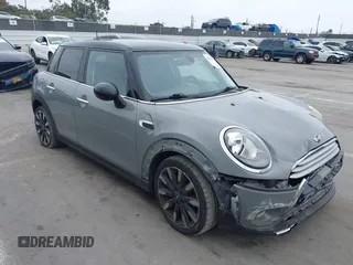 2015 MINI Hardtop 4 Door with VIN WMWXS5C57FT832162, listed as a IAAI auction lot 42159929 with 117,683 mi miles and . Bid and sale history available at DreamBid. Image 1.