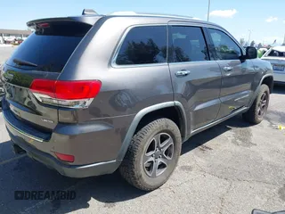 2014 Jeep Grand Cherokee Limited with VIN 1C4RJFBG5EC416620, listed as a IAAI auction lot 41967813 with 161,388 mi miles and . Bid and sale history available at DreamBid. Image 4.