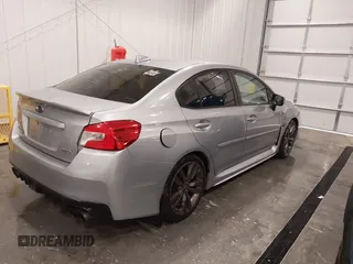 2016 Subaru WRX Premium with VIN JF1VA1E64G8811369, listed as a IAAI auction lot 41243335 with 129,319 mi miles. Bid and sale history available at carsss.com. Image 4.