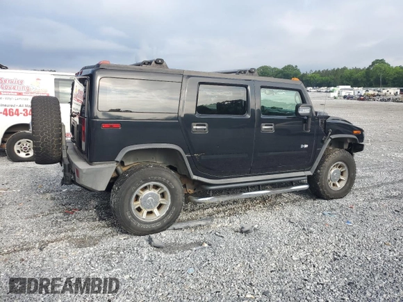2006 Hummer H2 z VIN 5GRGN23U66H116855, wystawiony jako Copart lot #56010175 z przebiegiem 217 798 mil mil oraz Tytuł czysty. Historia ofert i sprzedaży dostępna na DreamBid. Obrazek 3.