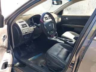 2010 Ford Fusion Hybrid z VIN 3FADP0L32AR148435, wystawiony jako IAAI lot #41987937 z przebiegiem 224 290 mil mil oraz . Historia ofert i sprzedaży dostępna na DreamBid. Obrazek 5.