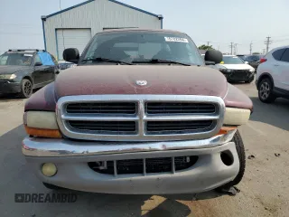 2000 Dodge Dakota Sport with VIN 1B7GG2AN1YS699073, listed as a Copart auction lot 70782284 with 141,876 mi miles and Salvage Title. Bid and sale history available at carsss.com. Image 5.
