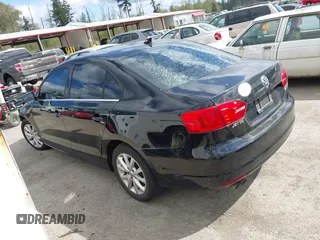 2013 Volkswagen Jetta Sedan SE w/Convenience/Sunroof with VIN 3VWDX7AJ0DM377828, listed as a IAAI auction lot 42081874 with 148,080 mi miles. Bid and sale history available at carsss.com. Image 3.