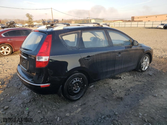 2012 Hyundai Elantra Touring SE with VIN KMHDC8AE0CU137417, listed as a Copart auction lot 47947295 with 141,259 mi miles and Salvage Title. Bid and sale history available at carsss.com. Image 3.